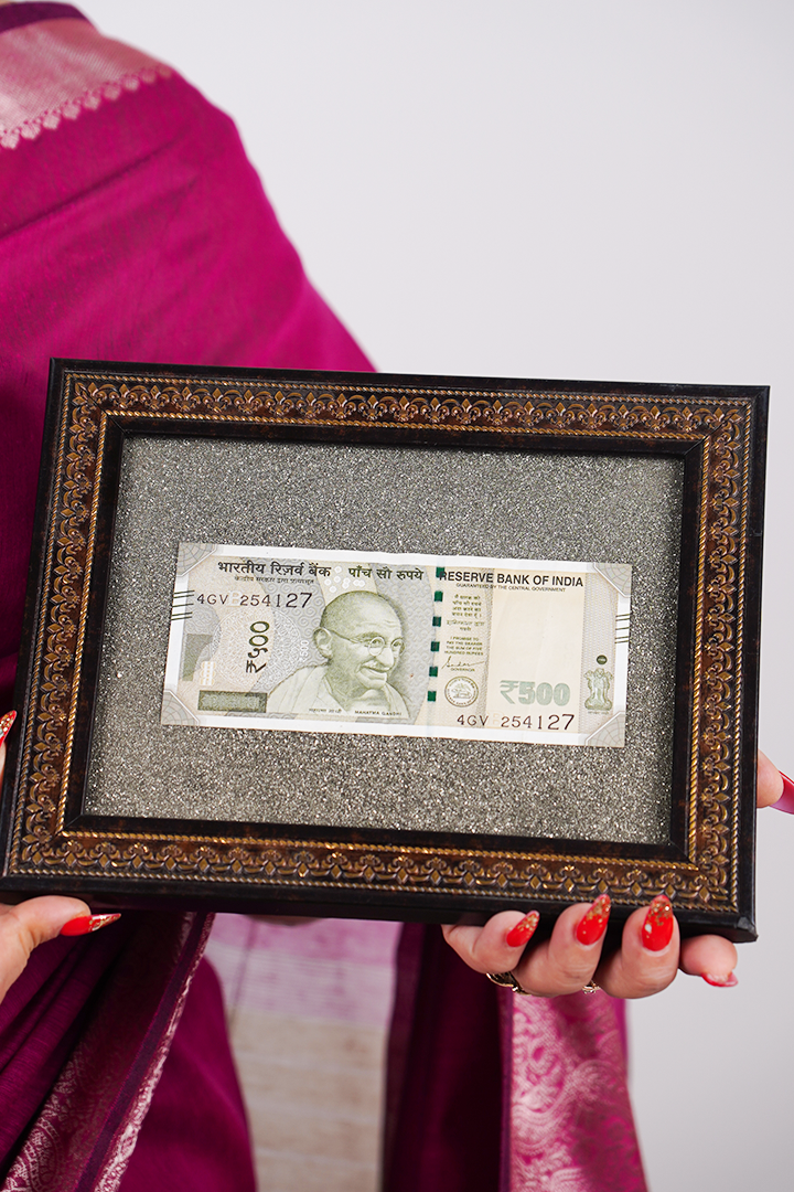 Real 500 rupee banknote sealed inside the pyrite frame